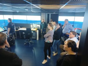 Euro-ZA Project partners visiting simulation room at SAMK and Samantha Montes on the bottom right.